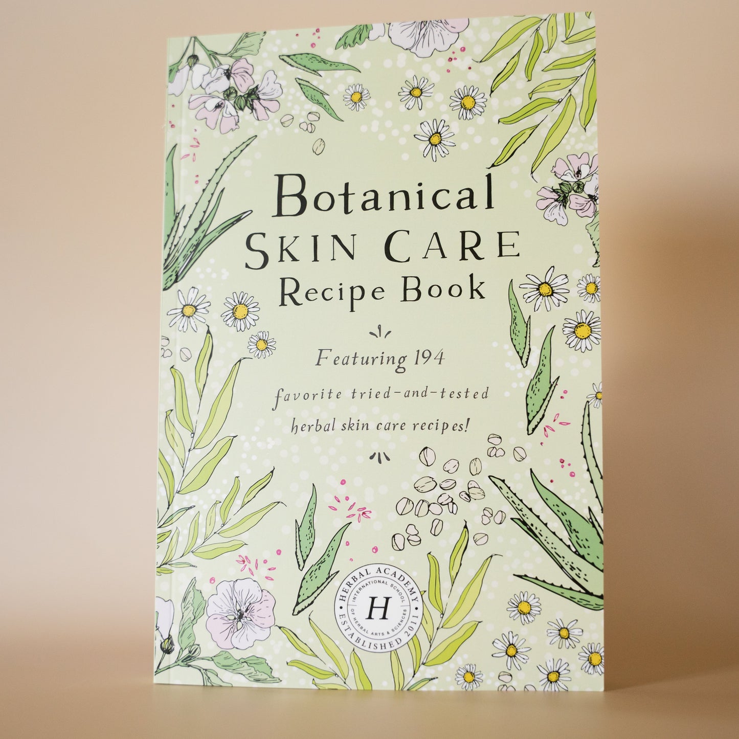 Recipe Book with title 'Botanical Skin Care Recipe Book' with floral designs