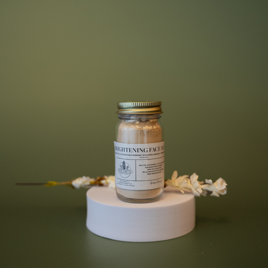 Jar of skincare product on a white stand with a green background