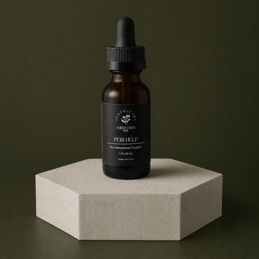 A dark amber glass dropper bottle with a black cap and black label reading 'SMITH & SMITH PERI HELP' and 'Perimedicinal Support', displayed on a light beige hexagonal pedestal against a dark olive green background.